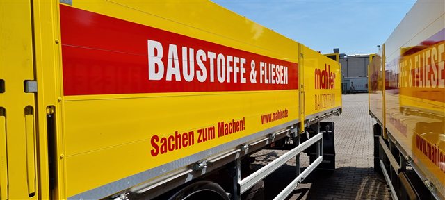 Gelber Mahler Bauzentrum LKW